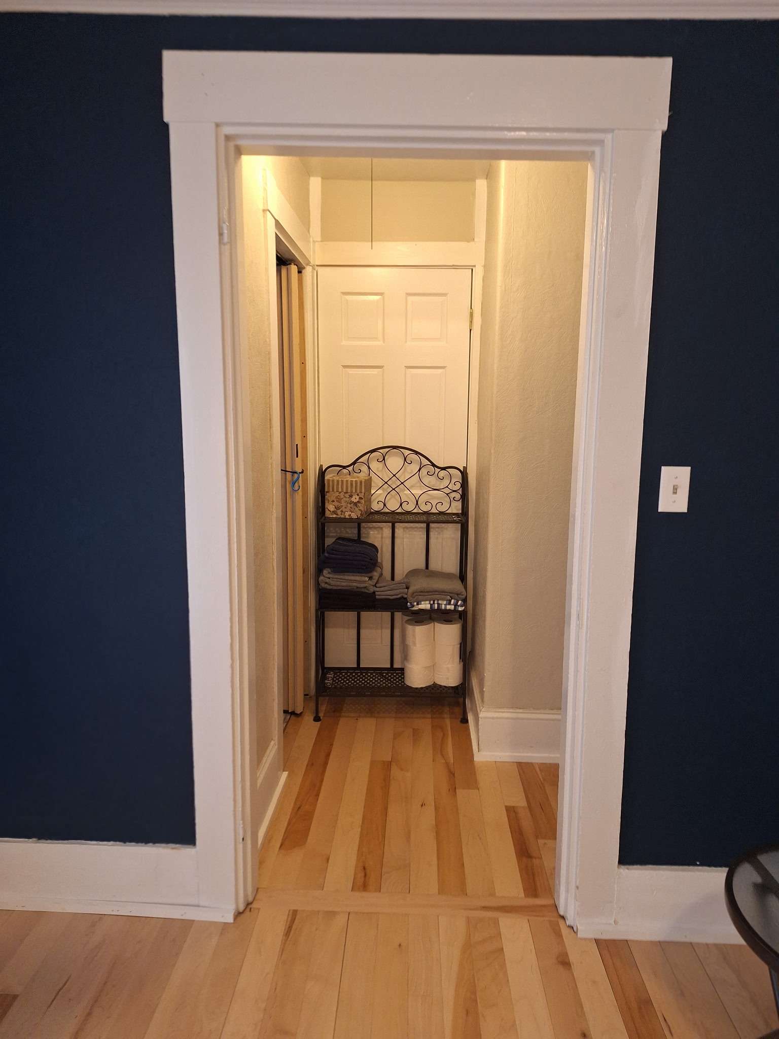 Linen closet with fresh towels and supplies in Skowhegan rental - all essentials provided