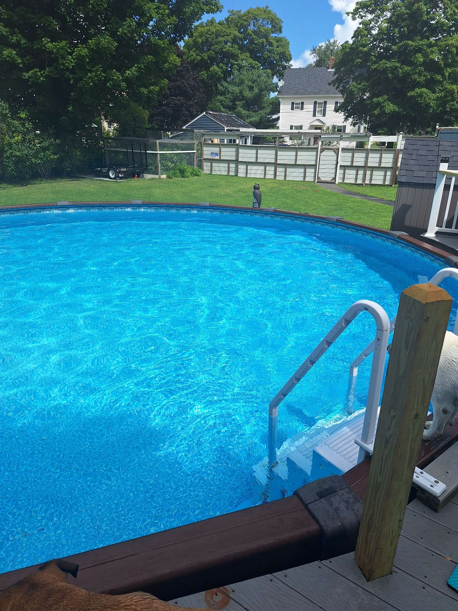 Refreshing above-ground pool with deck and steps - seasonal amenity for Skowhegan contractors